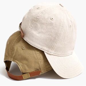 Black and cream baseball caps